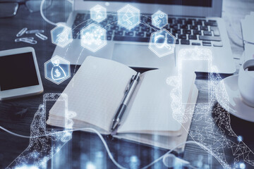 Fototapeta premium Double exposure of tech drawing and desk with open notebook background. Concept of technology