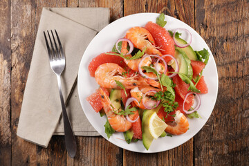 grilled shrimp skewer and lettuce