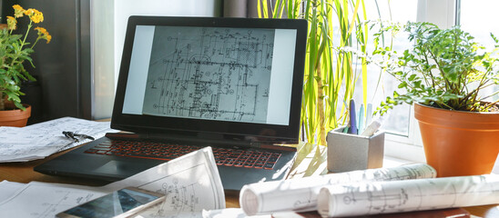 Architect works remotely from home in quarantine, lockdown covid 19 coronavirus. Remote work, stay...