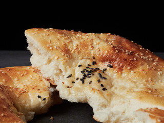 Traditional bread in Central Asia. Tandoor flatbread. Bread cakes. Traditional Uzbek the pellets.