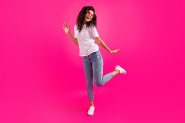 Full length body size view of attractive cheerful girl dancing chill out rest isolated over vivid pink fuchsia color background