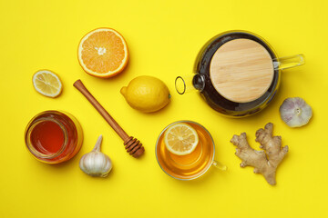 Concept of alternative cold treatment on yellow background, top view