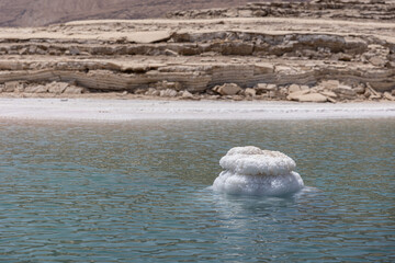 Dead sea salt crystals on the water