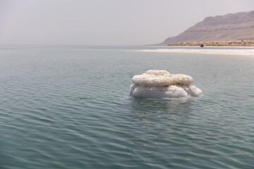 Dead sea salt crystals on the water