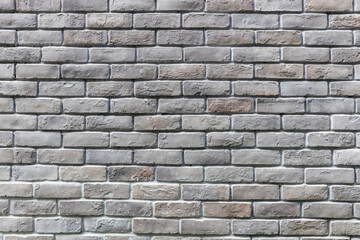 Obraz premium White brick wall background in rural room. Abstract weathered texture stained old stucco light gray. White grunge brick wall background. Misty brick wall for background or texture.