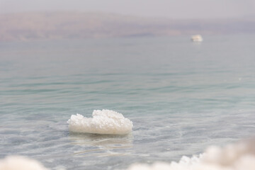 Dead sea salt crystals on the water