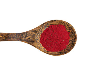 Flat lay view of red color beetroot superfood powder on wood spoon, isolated on white with lot of...