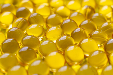 Fish oil capsules isolated on white background. Medical pills