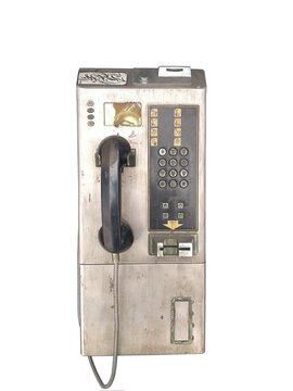 Public silver  telephone isolated on white, old and  dirty, in Thailand