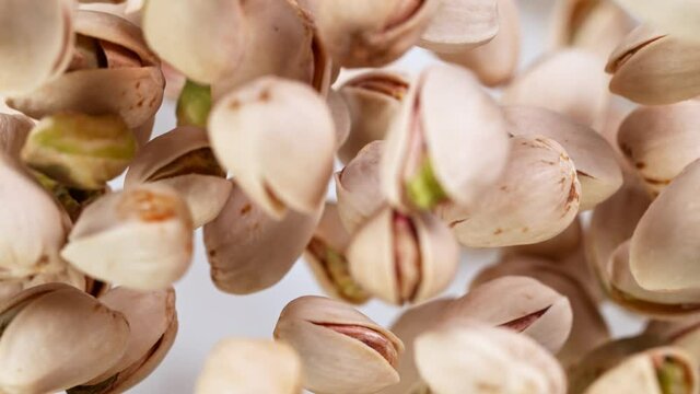 Super Slow Motion Shot of Fresh Roasted Pistachio Nuts