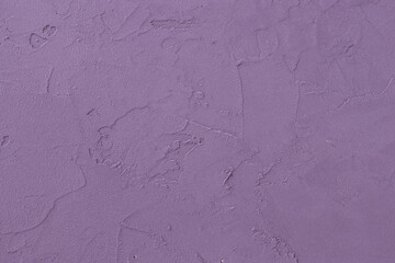 Horizontal photography purple colored decorative plaster surface. Purple concrete backdrop.