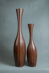 Decorative vases on a gray background.