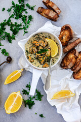 mussels in creamy sauce in a  frying pan.top view