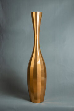 Decorative vases on a gray background.