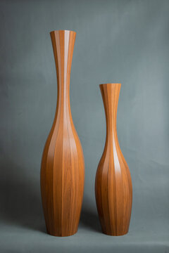 Decorative vases on a gray background.