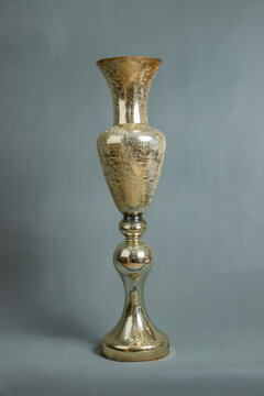 Decorative vases on a gray background.