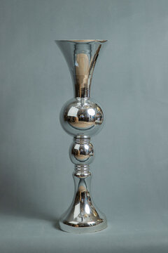 Decorative vases on a gray background.