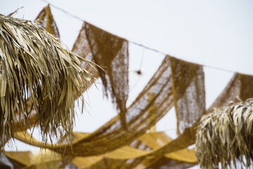 shading on a terrace on the beach in Vama Veche, Romania.