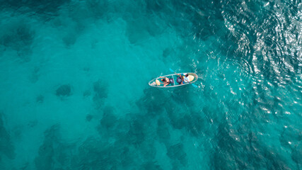 Fototapeta na wymiar Tourist sail kayak on the sea, with top view from drone.