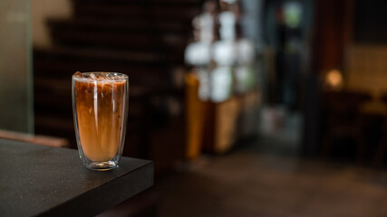 iced coffee on the table inside cafe