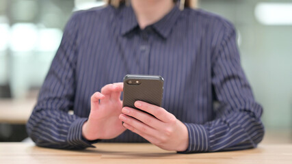 Close up of Businesswoman using Smartphone, Text Messaging