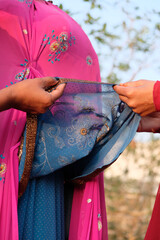 Fashion designers discussing work and dress