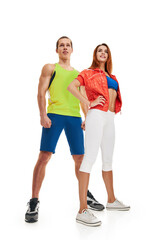 Full portrait of healthy athletic man and woman posing together