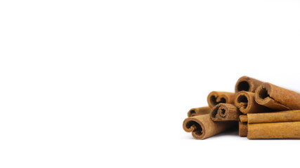 cinnamon sticks isolated on white background with copy space. Closeup, cinnamon sticks a lot.