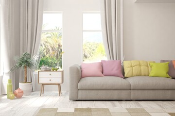 White living room with sofa and summer landscape in window. Scandinavian interior design. 3D illustration