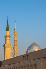 Fototapeta na wymiar Ottoman Turkish style minaret in Medina. Minarets of Masjid Nabawi - Prophet Mosque. Madinah al Munawwarah
