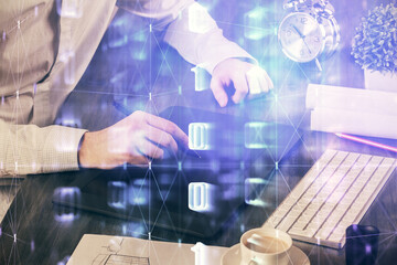 Multi exposure of man's hands holding and using a digital device and data theme drawing. Innovation concept.