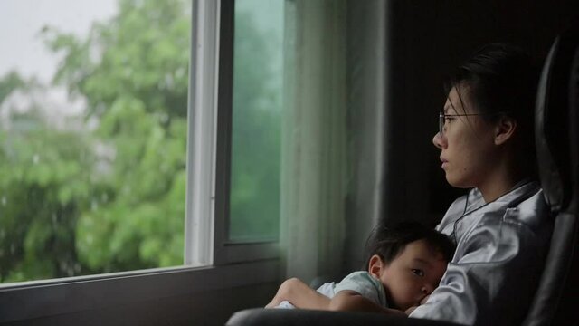 Tired Mother Suffering from experiencing postnatal depression.Health care single mom motherhood stressful.