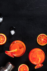 Orange cocktails, shot from above with blood oranges
