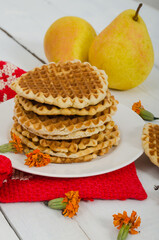 Appetizing waffles on a white plate