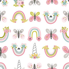 Rainbow and butterfly whimsical baby and nursery seamless pattern design in cute hand drawn vector style for fabric, textile, wallpaper