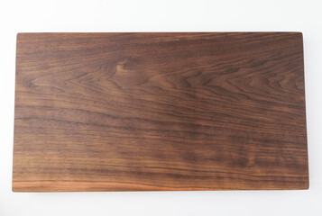 Wooden chopping board on white background