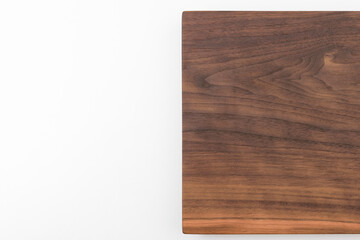 Wooden chopping board on white background