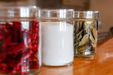 Glass bottles, red pepper, salt, Herbs