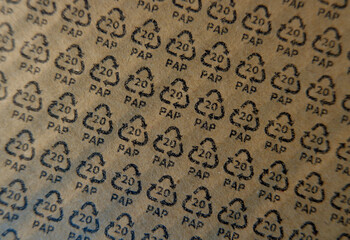 PAP20 sign on carton. Paper based material recycling information sign. Eco, recycling concept.