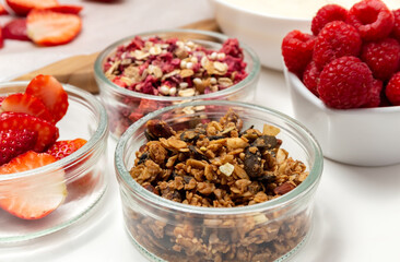 Ingredients for a healthy breakfast. Muesli, berries and yogurt. Healthy eating. Sports fitness menu. Concept. High quality photo
