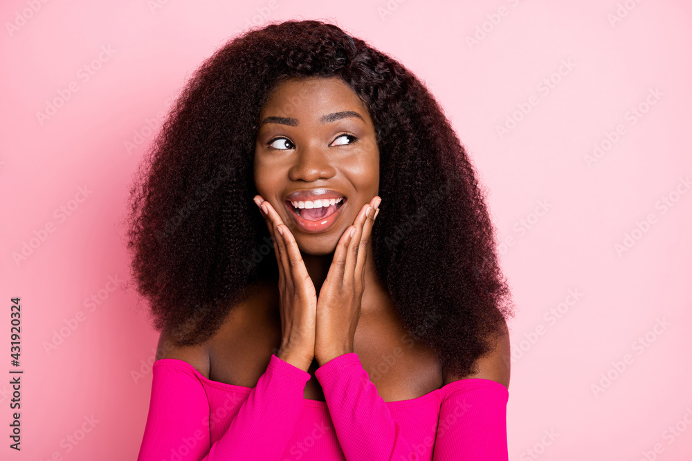 Sticker Photo of dreamy charming lady palms cheeks look empty space wear top uncovered shoulders isolated pink color background