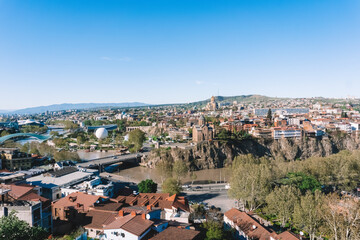 Fototapeta na wymiar Tbilisi, Georgia. Panorama view of Tbilisi with sights and the old city. Travel in Georgia concept