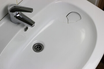 Accidentally broken bathroom sink. The concept of inevitable repair, replacement of equipment Buy a...