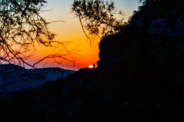 Obraz premium bright sunset in the mountains on a summer evening