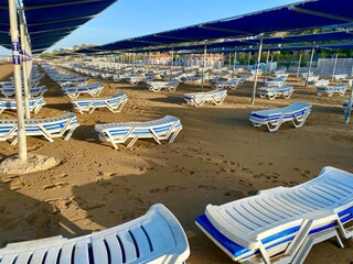 beach chairs and umbrellas