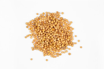 natural yellow mustard seeds isolated on white background, top view