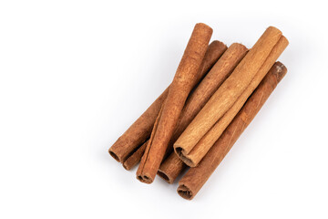 dry cinnamon sticks isolated on white background, top view