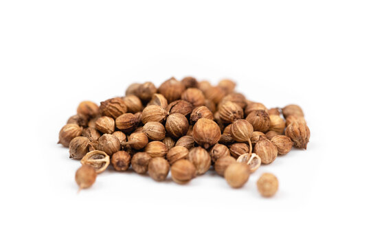 coriander seeds macro, isolated on white background