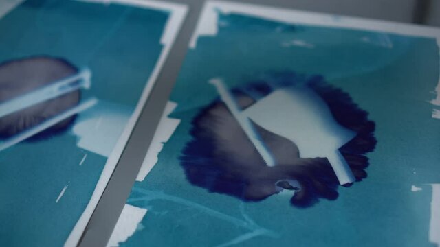 Art printing process adding ferric iodide to cyanotype mixture blue color come out