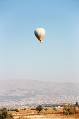 Balloon for aeronautics on the background of mountains